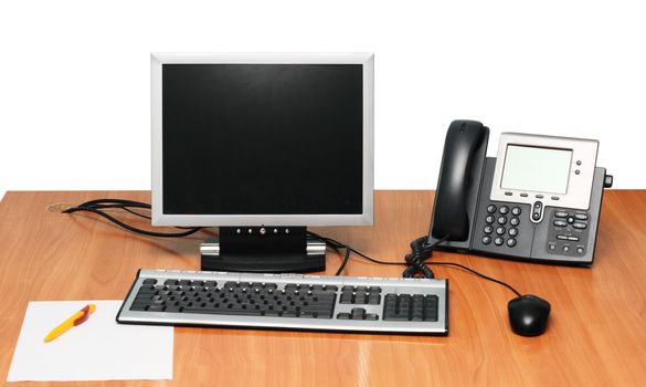 Modern Working Place with Computer and VoIP Phone