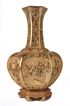 Beautiful golden clay vase isolated on white