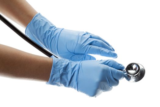 Cropped close-up shot image of a doctor wearing surgical glove and holding stethoscope.