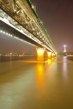 Yangtze river Road and Train bridge at dusk Wuhan Hubei province, China,