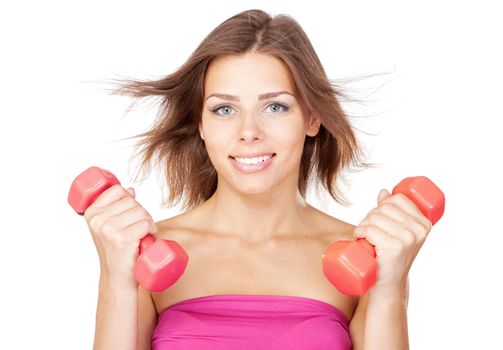 Beautiful slim woman with dumbbells, isolated on white background