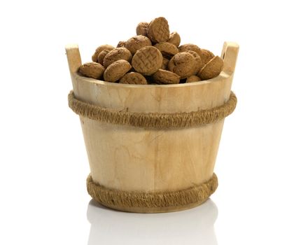 wooden sauna bucket with dutch pepernoten candy for children with sinterklaas party on 5 december