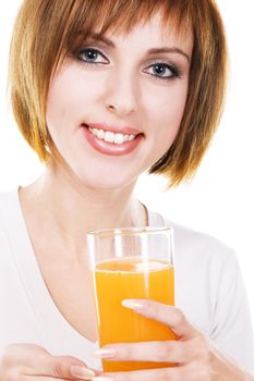 Lovely young woman with a glass of fresh juice against white background 