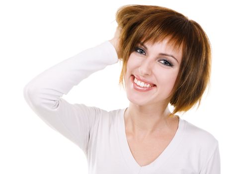 Portrait of a pretty joyful girl against white background