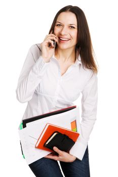 Cheerful businesswoman holding a bunch of documents, white background