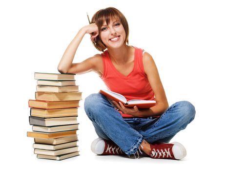 Lovely student with a stack of books, isolated on white 