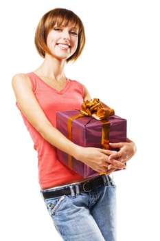 Cheerful girl with a gift box on white background 