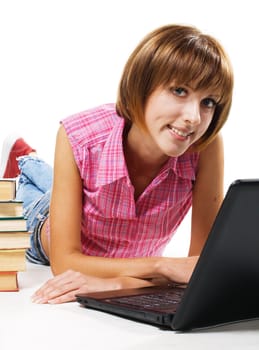 Cheerful student with laptop and books, white background