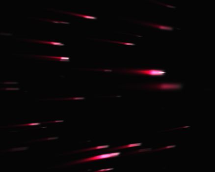 Pink falling stars against black background