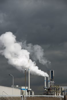 Heavy smoke from industrial chimney polluting the environment