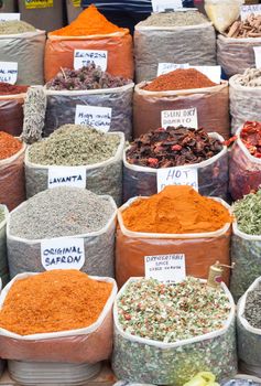 Market stall in Turgutreis (Turkey) offering a variety of spices and herbs including saffron, lavender, oregano, paprika, sundried tomato, cinnamon etc.