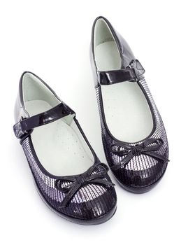 School footwear for the girl on a white background