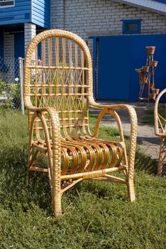 Armchair from willow rods at the rural house