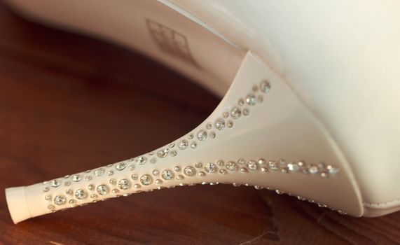 Heel with rhinestones bridal shoes closeup