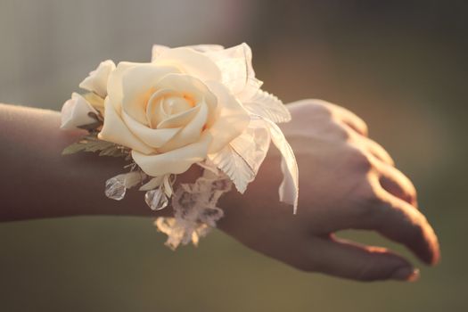 Flower on hand of the bridesmaids at the wedding