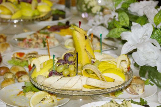 Beautifully decorated banana on serving table