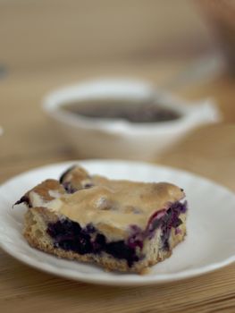 Piece of cake on a plate with jam and Pialat