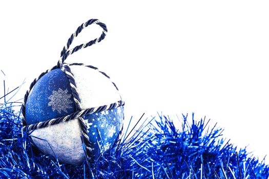 Italy. Traditional handmade Christmas ball made of white and blue fabric