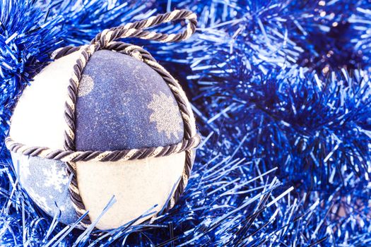 Italy. Traditional handmade Christmas balls made of white and blue fabric