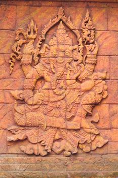 A stone carved sculpturee statue of an Indian god at Zafarie Word zoo in  Bangkok, Thailand. Photo taken on: June 24th, 2012.