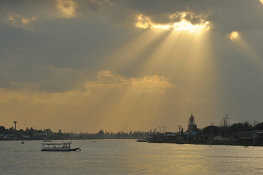 Beautiful silhouettes sunset clouds chao phraya river at Nonthaburi , Thailand.