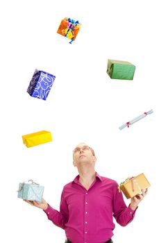 A business person juggling with some colorful gifts