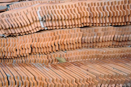 Pattern of the tile roof, which prepared for the Thai church being built.
