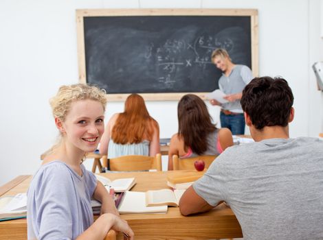 Teenagers studying in the high school. Concept of education