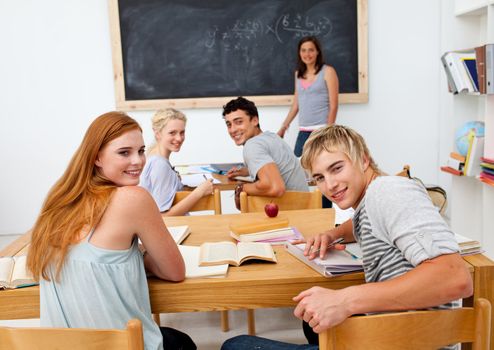 Teenagers studying in the high school. Concept of education