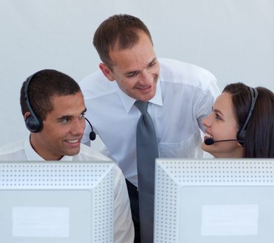 Manager and business people working in a call canter 