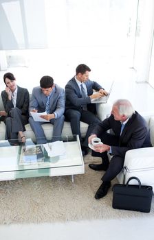 International Business people sitting and waiting for a job interview. Business concept.