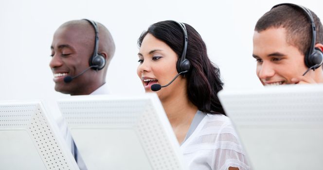 Multi-ethnic busines team with headset on working in a call center