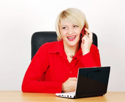 Business woman with phone and laptop