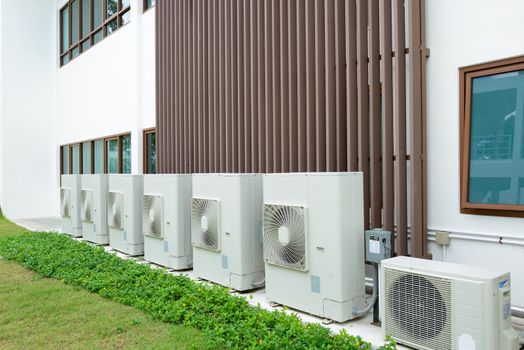 Compressor of air condition are set next to the building