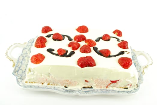 Strawberry cake with cream and chocolate