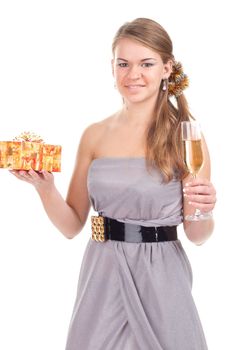 girl celebrates Christmas with a gift in the hands of studio photography