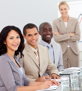 Young Business people at a presentation smiling and having fun