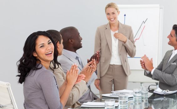 Young Businesswoman standing smilling after a presentation