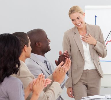 Young Businesswoman standing smilling after a presentation