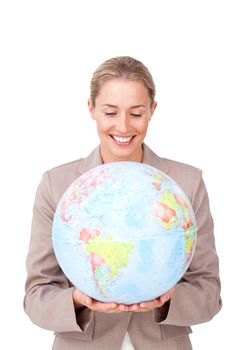 Visionary businesswoman smiling at global business expansion against a white background