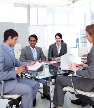 Business team studying a new business plan in a meeting