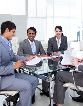 Smiling multi-ethnic business people in a meeting 