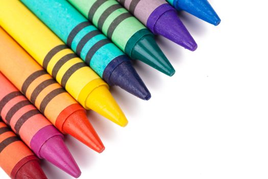 Colorful pencils over white background