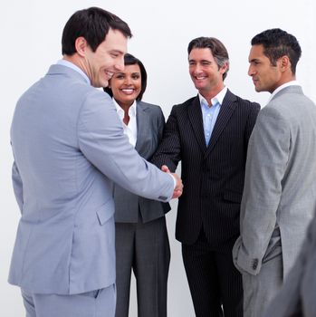 Business people greeting each other in the office