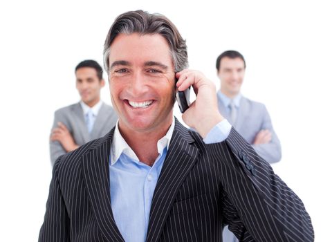 Laughing businessman talking on phone against a white background