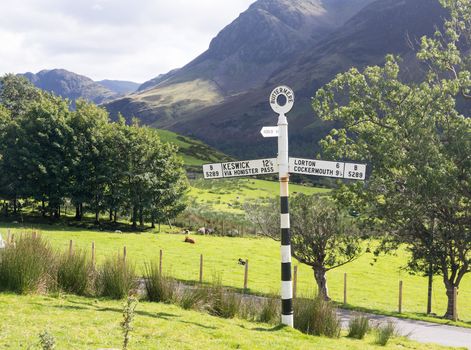 Old signpost near Wrynose Pass in Lake District