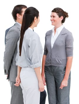 Smiling business people interacting standing against a white background