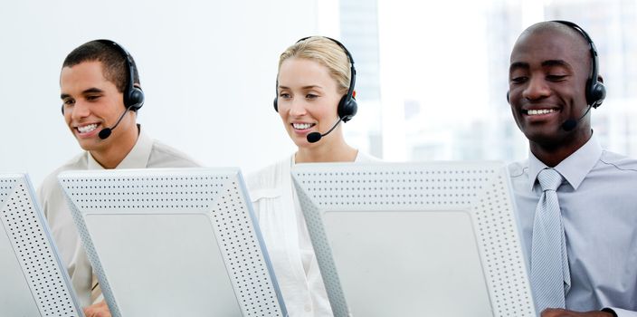 Multi-ethnic customer service representatives working in a call center