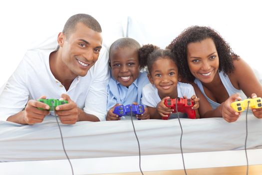 Animated family playing video game lying down on bed at home