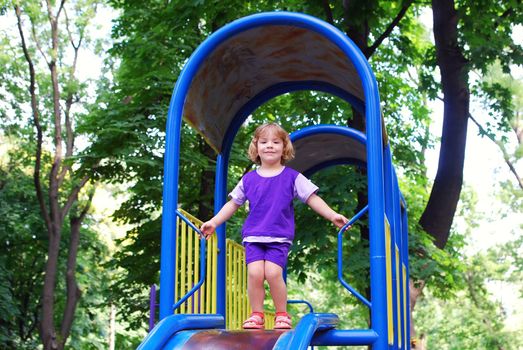 Beauty little girl in playground